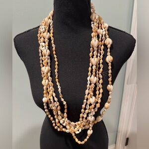 6 strands of Hawaiian cowrie shell necklaces various size shells
